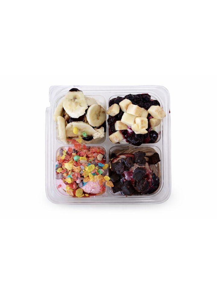 Toppings tray with fruit, candy, and chocolate
